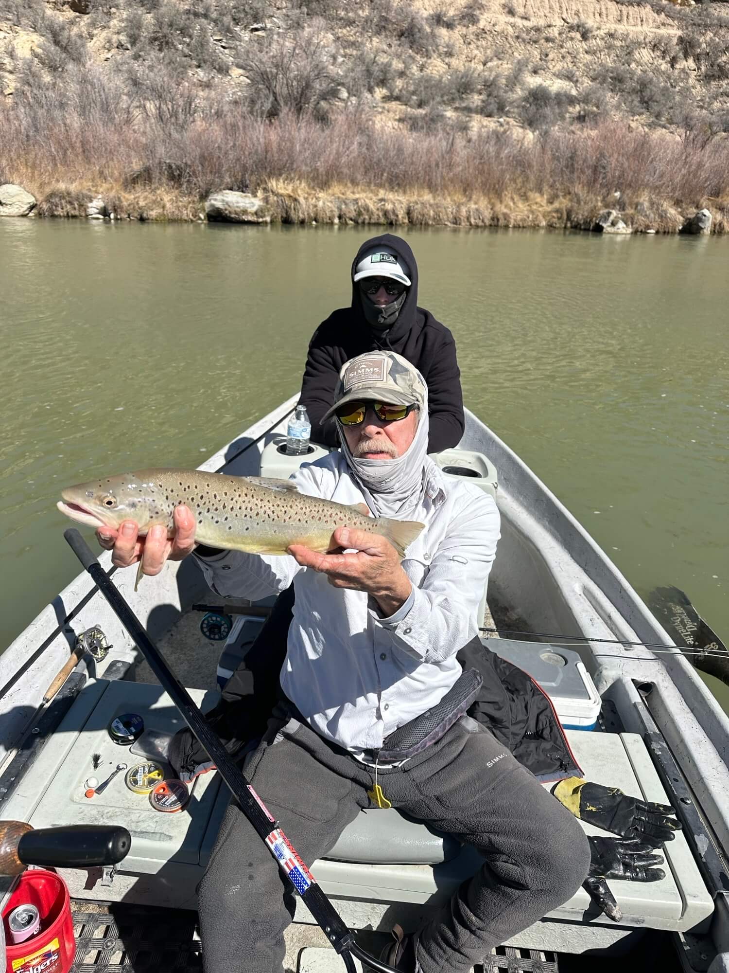Anglers with nice brown trout