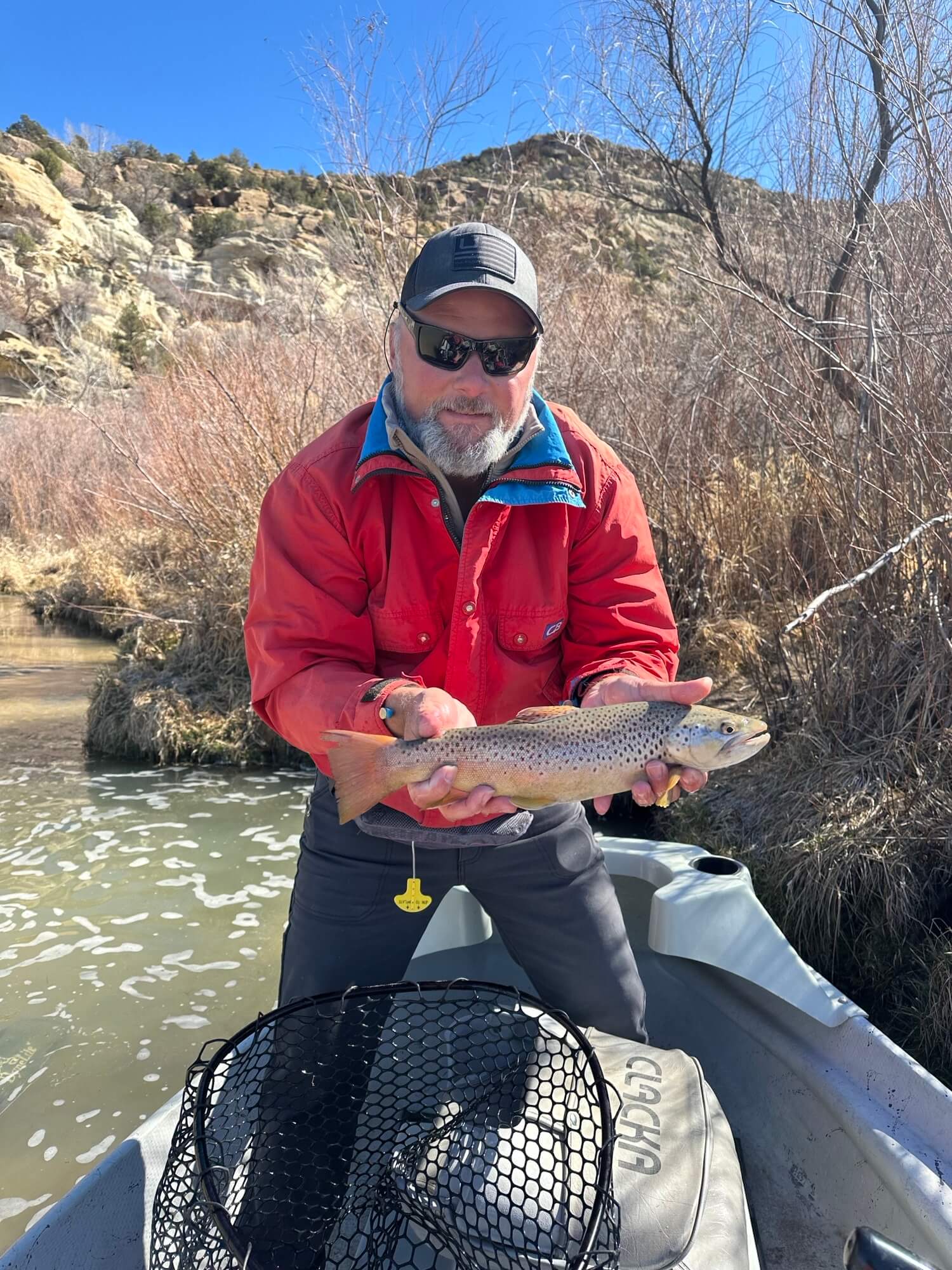 Anglers with nice brown trout
