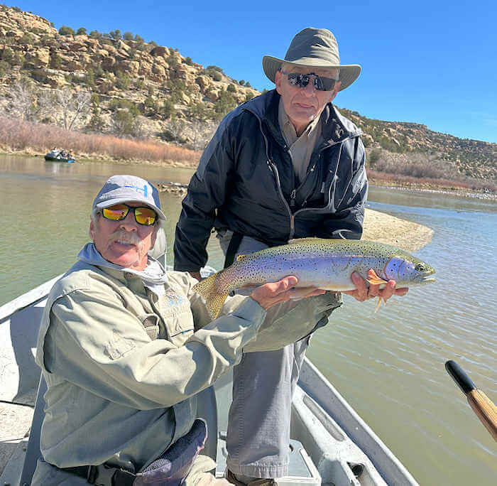 Angler with nice rainbow trout
