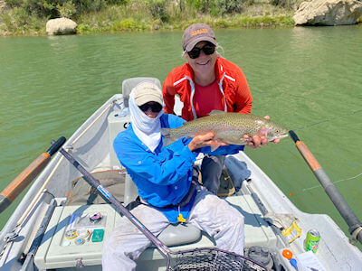 Client and Capt. Mark with beautiful rainbow.