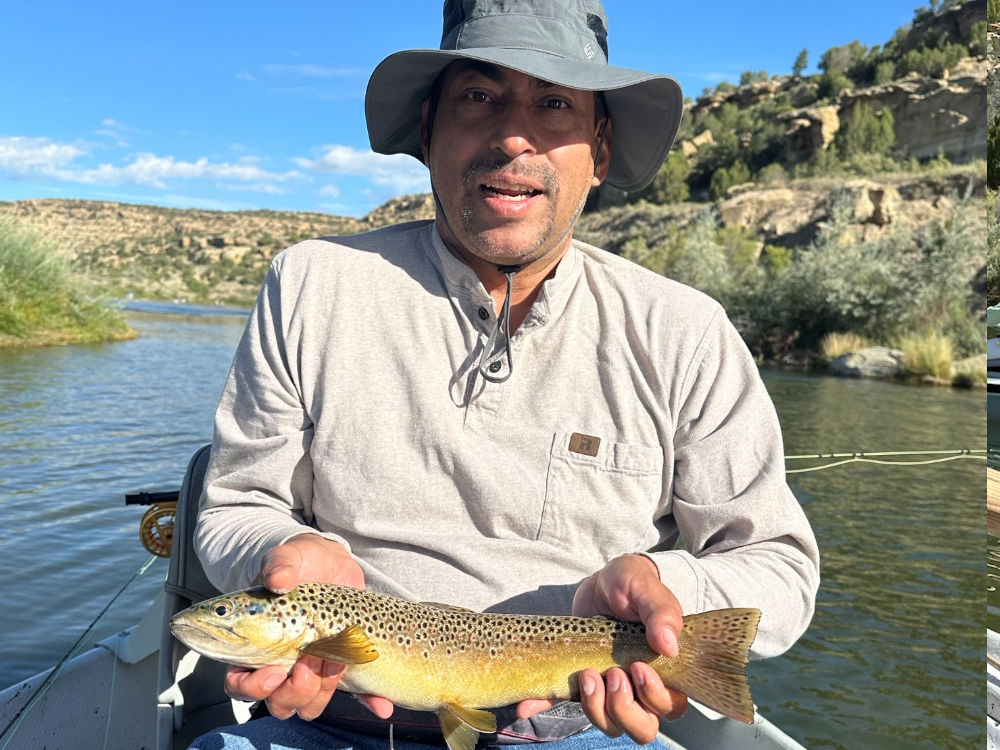 Happy client with pretty brown trout.